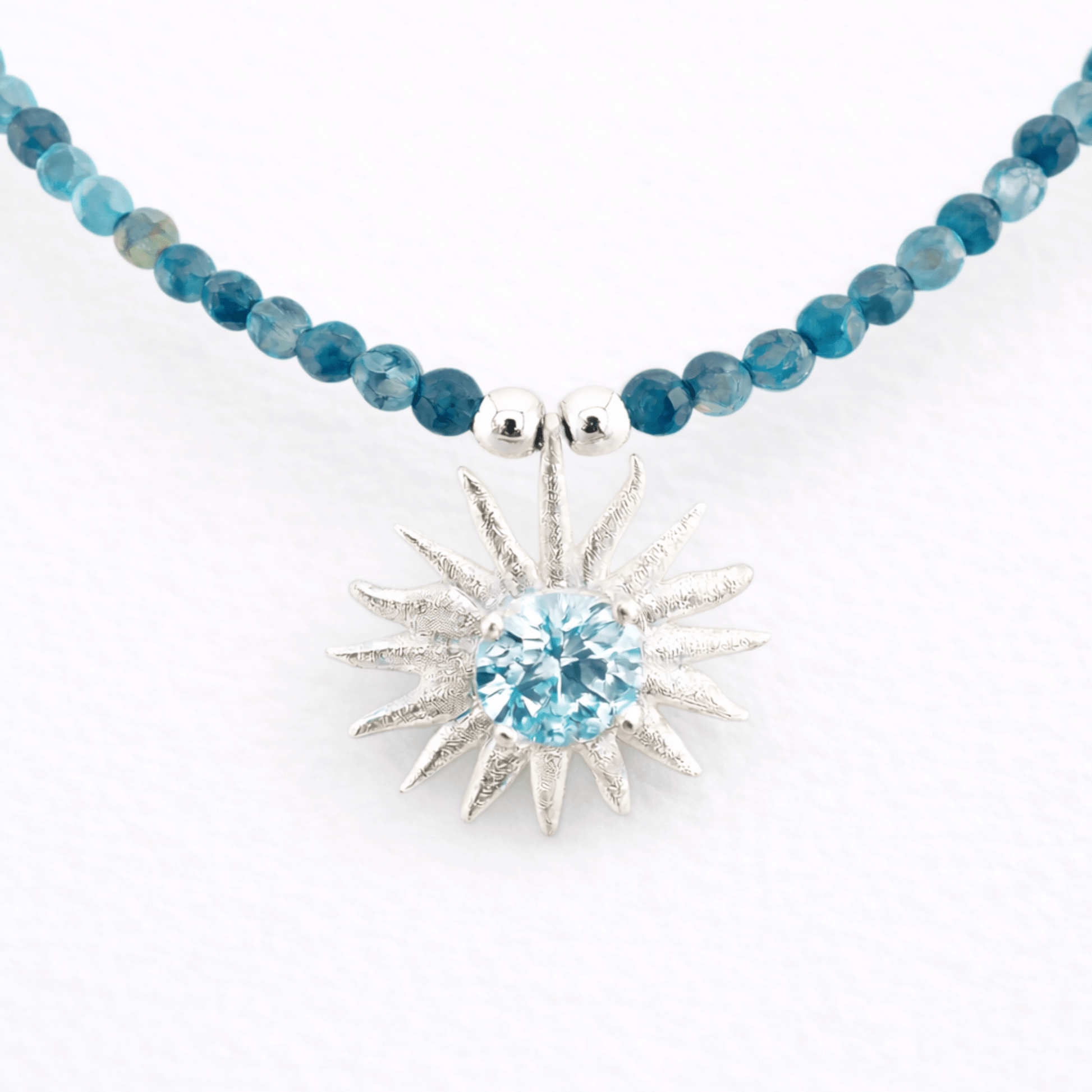 Colgante sol azul - Mateu Joyeros